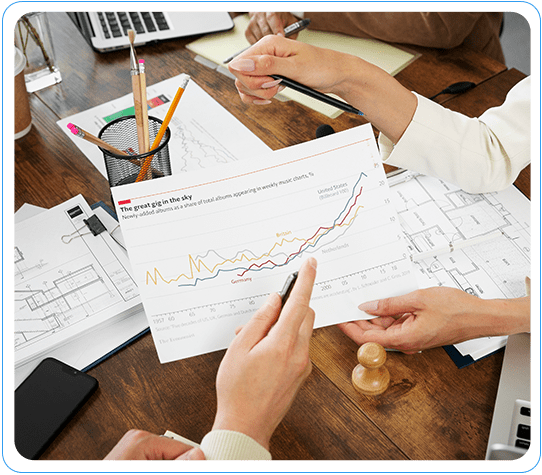 Team Analyzing Data Charts And Diagrams For A Comprehensive MuleSoft Solution Implementation