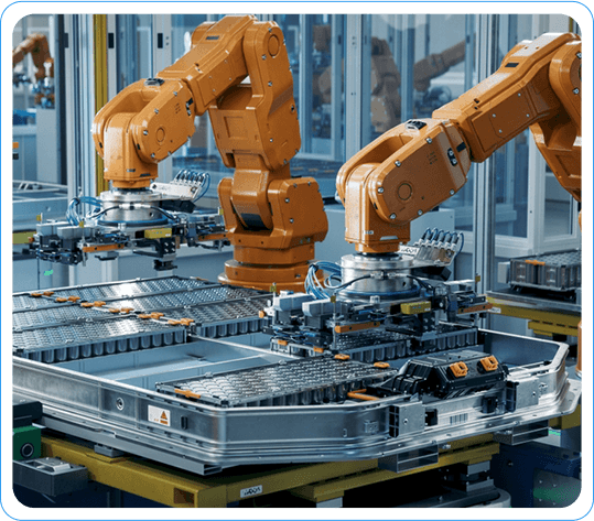 Robotic Arms Assembling Electronic Components In A Modern Manufacturing Factory With Precision Tools