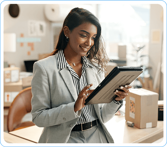 Businesswoman Using Tablet For Efficient Inventory Planning In A Modern Office Environment